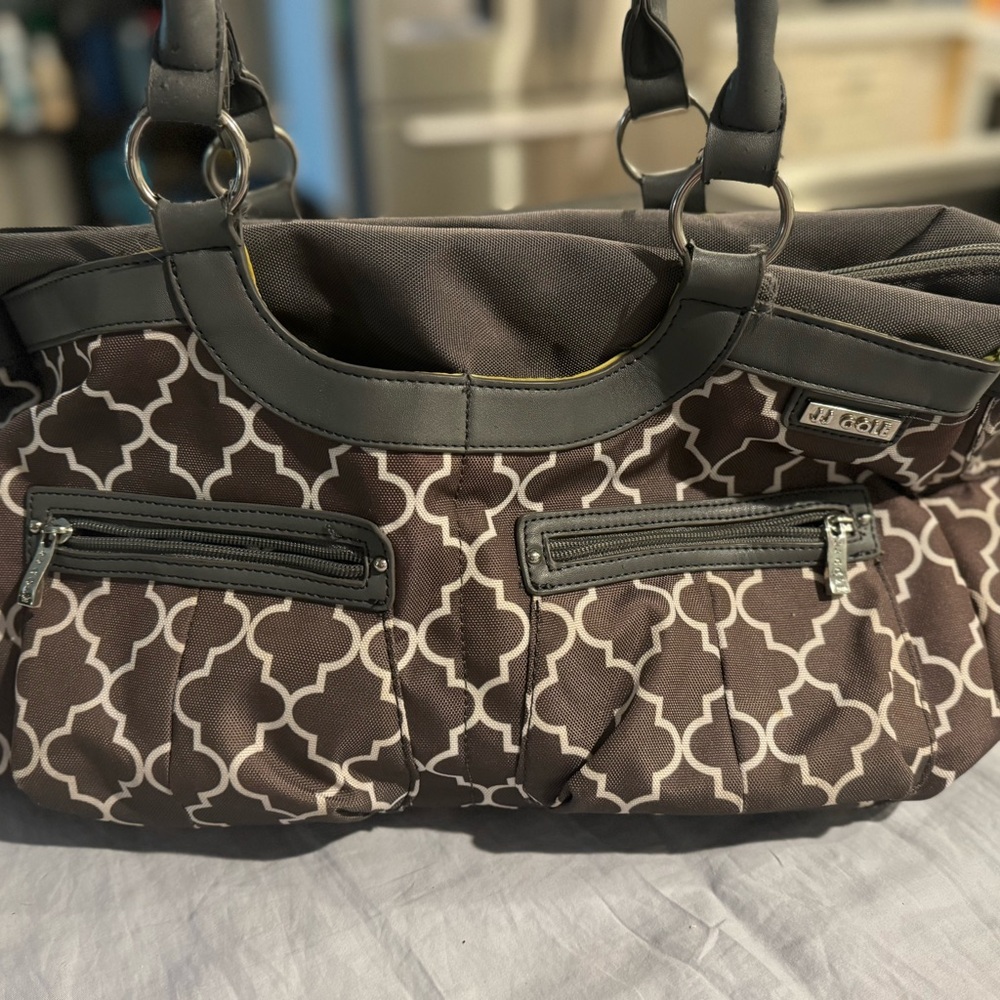 JJ Cole diaper bag- like new condition- 8 outside pockets - 4 inside pockets